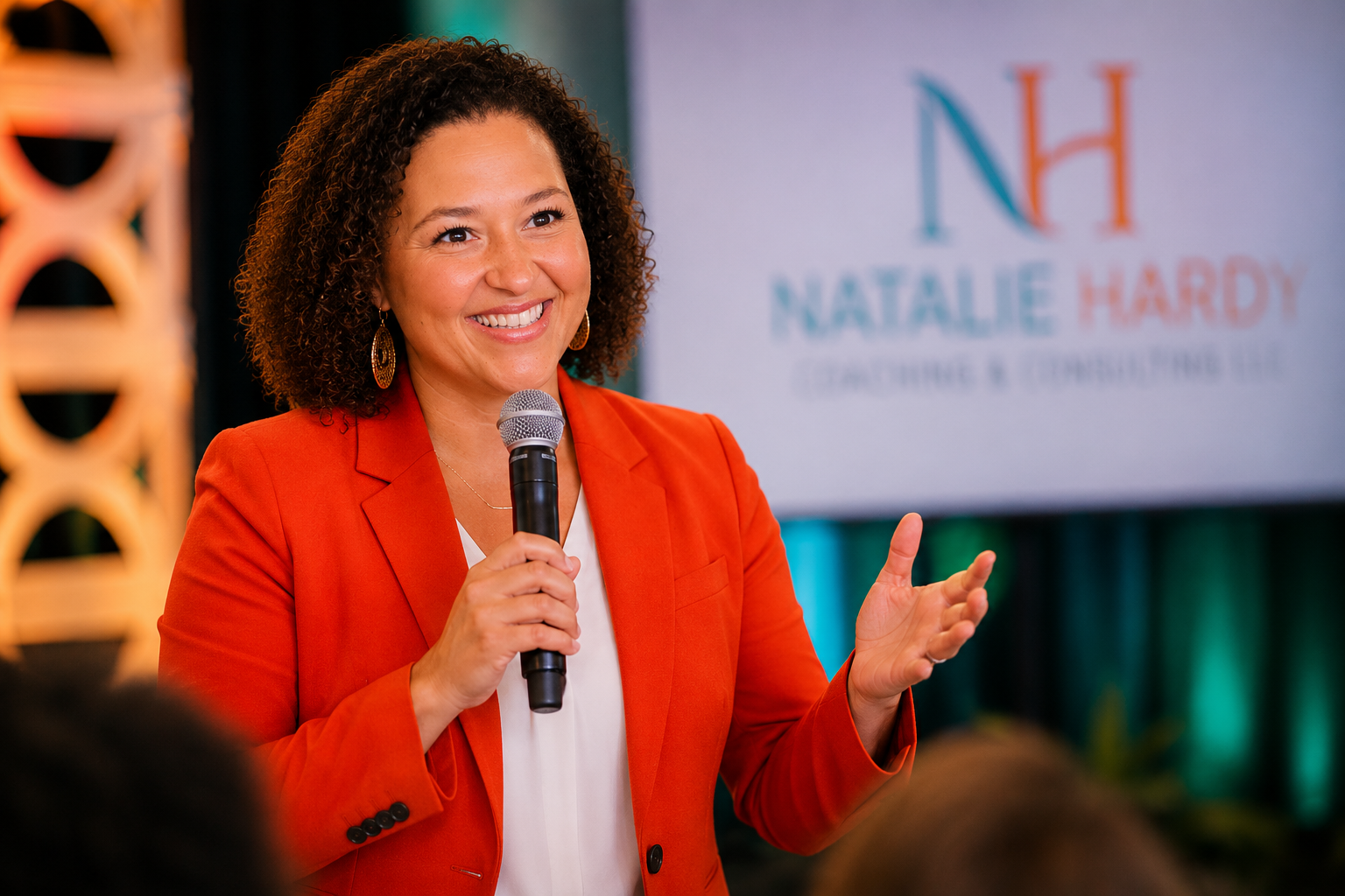 Natalie Hardy speaking on stage